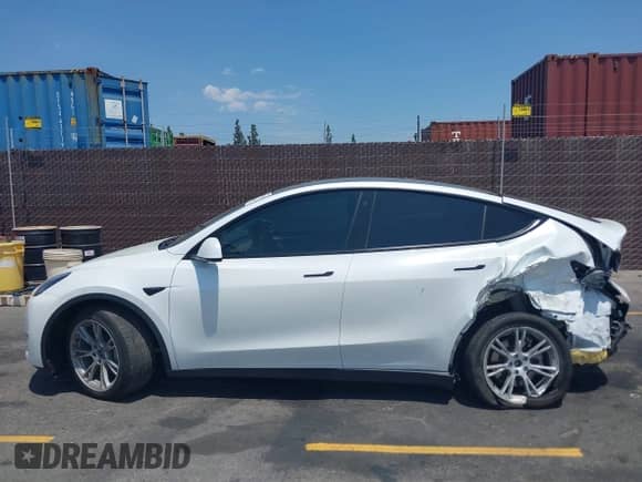2023 Tesla Model Y Long Range с VIN 7SAYGDEE8PA034371, выставлен на аукционе IAAI как лот 42765729 с пробегом Не указан миль и . История ставок и продаж доступна на DreamBid. Изображение 13.