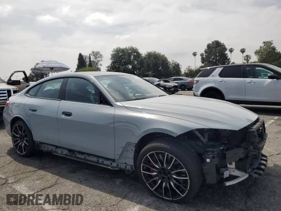2023 BMW i4 M50 с VIN WBY33AW07PFP68646, выставлен на аукционе Copart как лот 58441905 с пробегом 41 211 миль миль и Списание • Salvage title. История ставок и продаж доступна на DreamBid. Изображение 4.