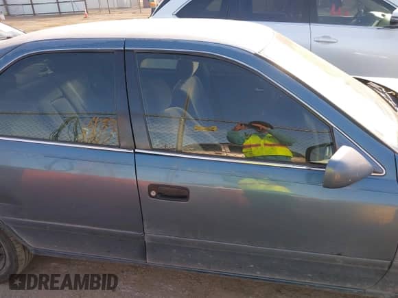 2001 Toyota Camry CE with VIN 4T1BG22K61U856097, listed as a IAAI auction lot 43319135 with Not provided miles and . Bid and sale history available at DreamBid. Image 13.