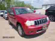 2009 Jeep Grand Cherokee with VIN 1J8HR68T79C539925, listed as a IAAI auction lot 42157077 with 140,443 mi miles and . Bid and sale history available at DreamBid. Image 1.