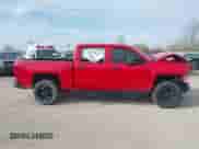 2014 Chevrolet Silverado 1500 LT z VIN 3GCUKREC2EG479477, wystawiony jako IAAI lot #41867034 z przebiegiem 159 893 mil mil oraz . Historia ofert i sprzedaży dostępna na DreamBid. Obrazek 14.