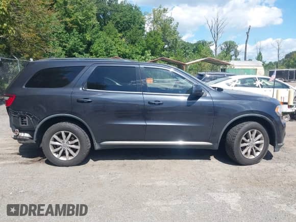 2014 Dodge Durango SXT z VIN 1C4RDJAG6EC468477, wystawiony jako IAAI lot #43049514 z przebiegiem 201 626 mil mil oraz . Historia ofert i sprzedaży dostępna na DreamBid. Obrazek 13.