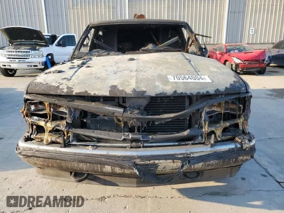 1997 Chevrolet Tahoe с VIN 1GNEK13RXVJ429428, выставлен на аукционе Copart как лот 70564004 с пробегом Не указан миль и На запчасти • Non repairable. История ставок и продаж доступна на DreamBid. Изображение 5.