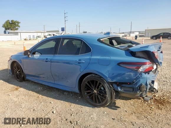2023 Toyota Camry Hybrid XSE с VIN 4T1K31AK7PU046557, выставлен на аукционе Copart как лот 71445455 с пробегом 33 068 миль миль и Списание • Salvage title. История ставок и продаж доступна на DreamBid. Изображение 2.