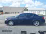 2013 Dodge Avenger SXT with VIN 1C3CDZCBXDN615817, listed as a IAAI auction lot 43282287 with 245,259 mi miles and . Bid and sale history available at DreamBid. Image 14.