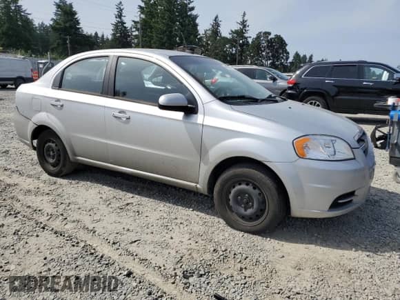 2011 Chevrolet Aveo 1LT with VIN KL1TD5DE2BB199149, listed as a Copart auction lot 60647825 with 100,834 mi miles and Salvage title. Bid and sale history available at DreamBid. Image 4.