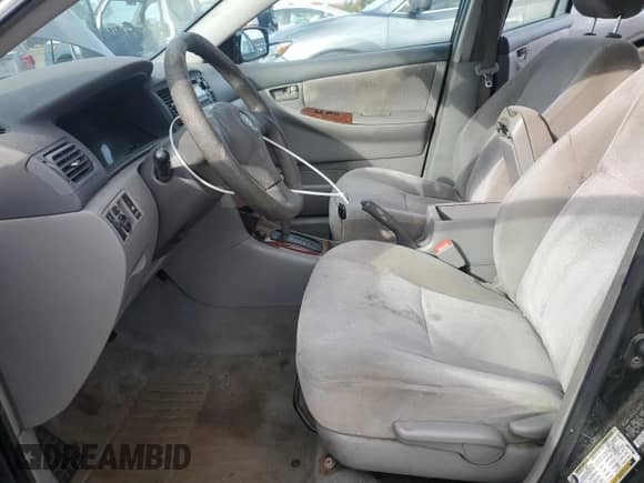 2006 Toyota Corolla LE z VIN 2T1BR32E16C621027, wystawiony jako Copart lot #82719205 z przebiegiem 234 878 mil mil oraz Czysty tytuł • Clean title. Historia ofert i sprzedaży dostępna na DreamBid. Obrazek 7.