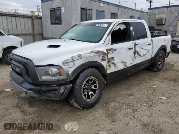 2018 Ram 1500 Rebel с VIN 1C6RR7YT7JS235965, выставлен на аукционе Copart как лот 84749674 с пробегом 61 484 миль миль и Списание • Salvage title. История ставок и продаж доступна на DreamBid. Изображение 1.