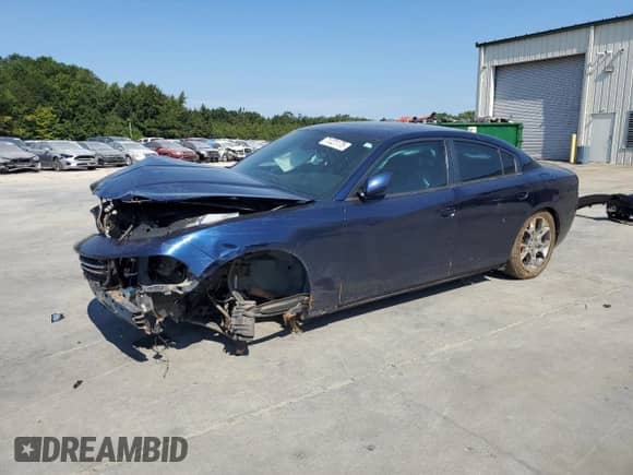 2015 Dodge Charger SE with VIN 2C3CDXFG5FH742319, listed as a Copart auction lot 71221175 with 106,487 mi miles and Salvage title. Bid and sale history available at DreamBid. Image 1.