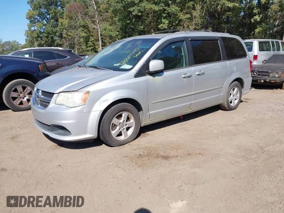 2011 Dodge Grand Caravan Mainstreet with VIN 2D4RN3DG7BR728914, listed as a IAAI auction lot 43389745 with 219,923 mi miles and . Bid and sale history available at DreamBid. Image 2.