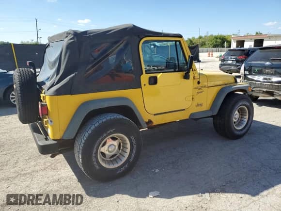 2000 Jeep Wrangler Sport z VIN 1J4FA49S0YP763894, wystawiony jako Copart lot #83925635 z przebiegiem 205 752 mil mil oraz Czysty tytuł • Clean title. Historia ofert i sprzedaży dostępna na DreamBid. Obrazek 3.