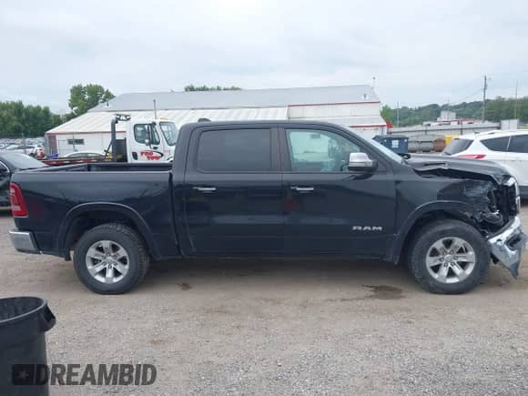 2022 Ram 1500 Laramie z VIN 1C6SRFJT2NN179069, wystawiony jako IAAI lot #43127220 z przebiegiem 83 741 mil mil oraz . Historia ofert i sprzedaży dostępna na DreamBid. Obrazek 13.