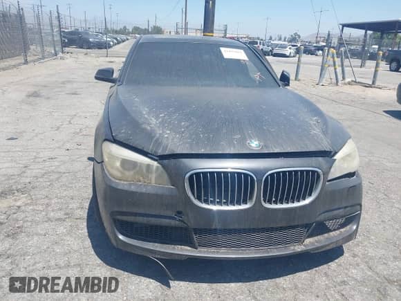 2013 BMW 7 Series 750i with VIN WBAYA8C57DC996601, listed as a IAAI auction lot 42497017 with 137,222 mi miles and . Bid and sale history available at DreamBid. Image 6.