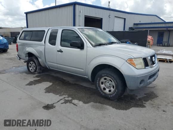 2005 Nissan Frontier XE with VIN 1N6BD06T25C443347, listed as a Copart auction lot 65627085 with 122,079 mi miles and Salvage title. Bid and sale history available at DreamBid. Image 4.