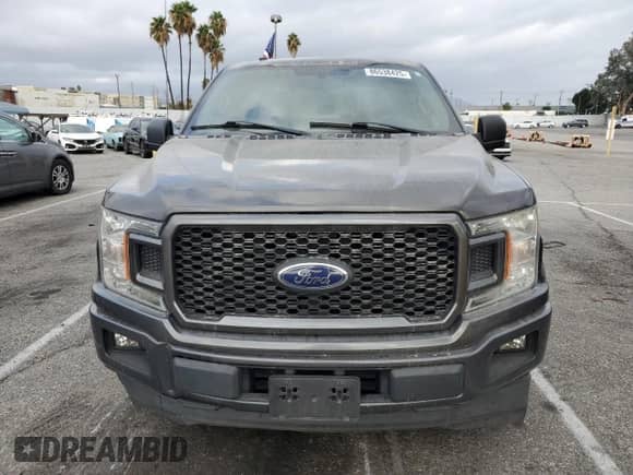 2018 Ford F-150 XL z VIN 1FTEW1CP7JKC25122, wystawiony jako Copart lot #86538425 z przebiegiem 118 557 mil mil oraz Szkoda całkowita • Salvage title. Historia ofert i sprzedaży dostępna na DreamBid. Obrazek 5.