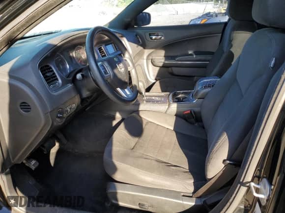 2013 Dodge Charger SE с VIN 2C3CDXBG9DH706040, выставлен на аукционе Copart как лот 70147275 с пробегом 268 845 миль миль и На запчасти • Non repairable. История ставок и продаж доступна на DreamBid. Изображение 7.