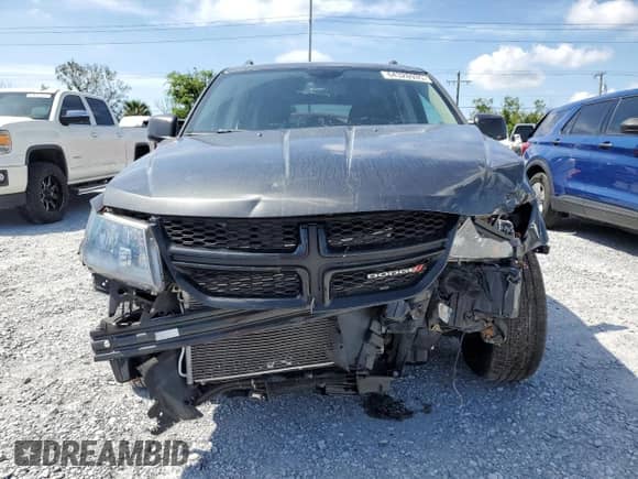 2014 Dodge Journey Crossroad z VIN 3C4PDCGG5ET261464, wystawiony jako Copart lot #64328935 z przebiegiem 74 564 mil mil oraz Szkoda całkowita • Salvage title. Historia ofert i sprzedaży dostępna na DreamBid. Obrazek 5.