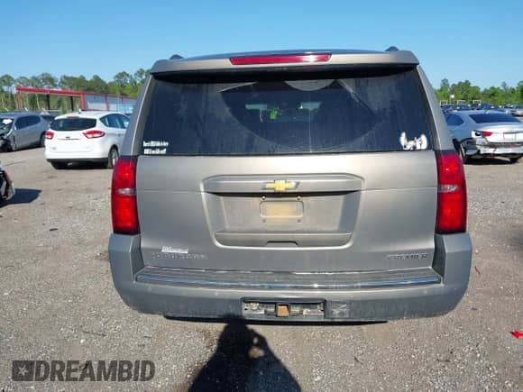 2019 Chevrolet Suburban Premier with VIN 1GNSCJKC3KR129739, listed as a IAAI auction lot 42044708 with 105,771 mi miles and . Bid and sale history available at DreamBid. Image 16.