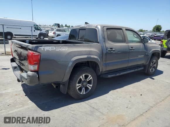 2017 Toyota Tacoma SR5 with VIN 3TMCZ5AN8HM069280, listed as a Copart auction lot 64744555 with 140,450 mi miles and Salvage title. Bid and sale history available at DreamBid. Image 3.
