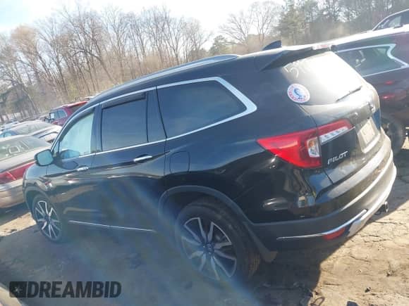 2022 Honda Pilot Elite with VIN 5FNYF6H03NB085997, listed as a IAAI auction lot 41823176 with 21,646 mi miles and . Bid and sale history available at DreamBid. Image 14.