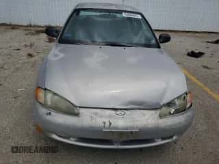 1997 Hyundai Elantra с VIN KMHJF24M9VU540731, выставлен на аукционе Copart как лот 63684645 с пробегом Не указан миль и Списание • Salvage title. История ставок и продаж доступна на DreamBid. Изображение 5.