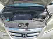 2005 Honda Odyssey LX with VIN 5FNRL38215B119299, listed as a Copart auction lot 68343995 with 140,319 mi miles and Salvage title. Bid and sale history available at DreamBid. Image 12.