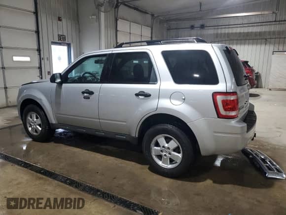 2011 Ford Escape XLT с VIN 1FMCU9DG9BKC35478, выставлен на аукционе Copart как лот 72022735 с пробегом 140 282 миль миль и Списание • Salvage title. История ставок и продаж доступна на DreamBid. Изображение 2.