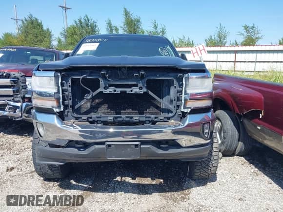 2016 Chevrolet Silverado 1500 LT with VIN 3GCUKREC3GG231290, listed as a IAAI auction lot 40113464 with 160,109 mi miles and . Bid and sale history available at DreamBid. Image 12.