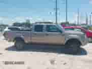 2003 Nissan Frontier XE z VIN 1N6ED29Y03C450987, wystawiony jako IAAI lot #42600507 z przebiegiem 143 488 mil mil oraz . Historia ofert i sprzedaży dostępna na DreamBid. Obrazek 13.