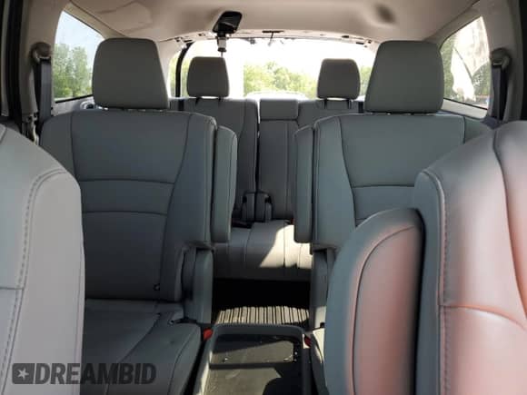 2021 Honda Pilot Touring 7-Passenger z VIN 5FNYF6H63MB025849, wystawiony jako Copart lot #60432205 z przebiegiem 78 277 mil mil oraz Czysty tytuł • Clean title. Historia ofert i sprzedaży dostępna na DreamBid. Obrazek 10.