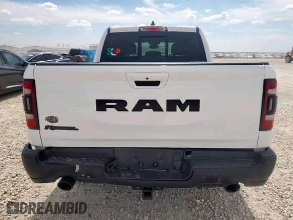 2019 Ram 1500 Rebel z VIN 1C6RRELT4KN829070, wystawiony jako Copart lot #65263685 z przebiegiem 142 585 mil mil oraz Szkoda całkowita • Salvage title. Historia ofert i sprzedaży dostępna na DreamBid. Obrazek 6.