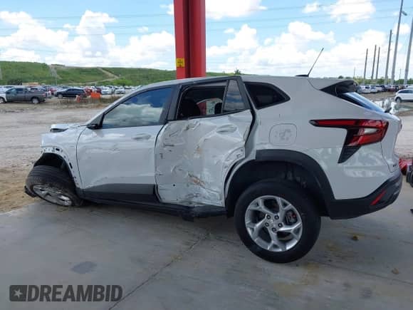 2024 Chevrolet Trax LS with VIN KL77LFE29RC082645, listed as a IAAI auction lot 43030987 with 22,965 mi miles and . Bid and sale history available at DreamBid. Image 14.
