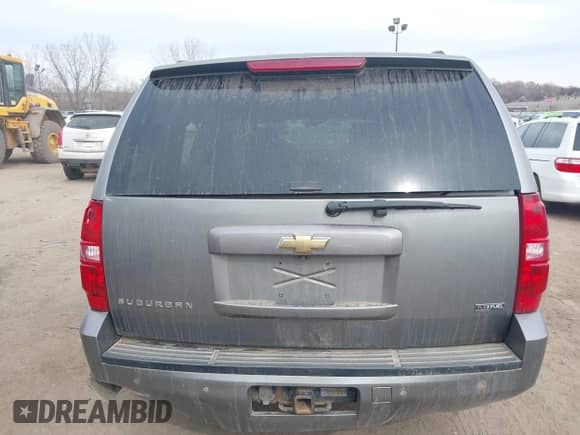 2007 Chevrolet Suburban LT z VIN 1GNFC16057R413155, wystawiony jako IAAI lot #41884665 z przebiegiem 205 038 mil mil oraz . Historia ofert i sprzedaży dostępna na DreamBid. Obrazek 16.