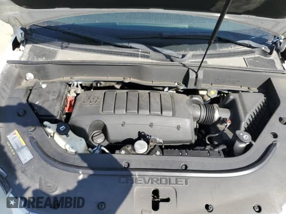 2012 Chevrolet Traverse 1LT z VIN 1GNKRGED0CJ138419, wystawiony jako Copart lot #90119345 z przebiegiem 128 476 mil mil oraz Czysty tytuł • Clean title. Historia ofert i sprzedaży dostępna na DreamBid. Obrazek 12.