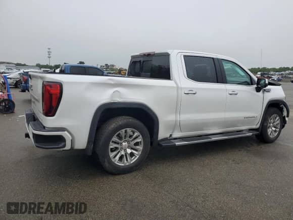 2023 GMC Sierra 1500 Denali z VIN 1GTUUGED3PZ109844, wystawiony jako Copart lot #59780445 z przebiegiem 32 409 mil mil oraz Szkoda całkowita • Salvage title. Historia ofert i sprzedaży dostępna na DreamBid. Obrazek 3.