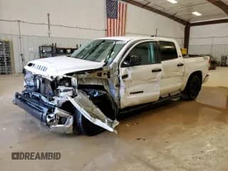 2021 Toyota Tundra SR5 with VIN 5TFEY5F19MX286696, listed as a Copart auction lot 64726785 with 114,937 mi miles and Clean title. Bid and sale history available at DreamBid. Image 1.