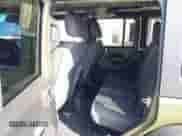 2024 Jeep Wrangler Sport S with VIN 1C4PJXDN0RW107960, listed as a IAAI auction lot 43155437 with 9,103 mi miles and . Bid and sale history available at DreamBid. Image 8.