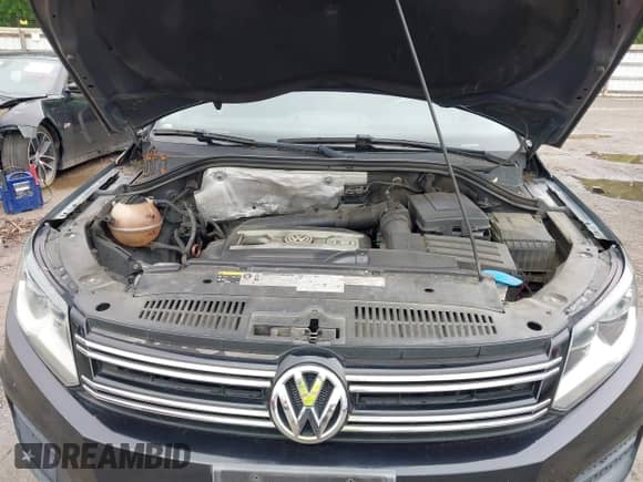 2013 Volkswagen Tiguan SE with VIN WVGAV7AX6DW544544, listed as a IAAI auction lot 42362914 with 119,754 mi miles and . Bid and sale history available at DreamBid. Image 10.