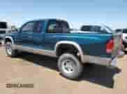 1999 Dodge Dakota SLT z VIN 1B7GG22Y6XS255372, wystawiony jako Copart lot #60740725 z przebiegiem 134 980 mil mil oraz Szkoda całkowita • Salvage title. Historia ofert i sprzedaży dostępna na DreamBid. Obrazek 2.