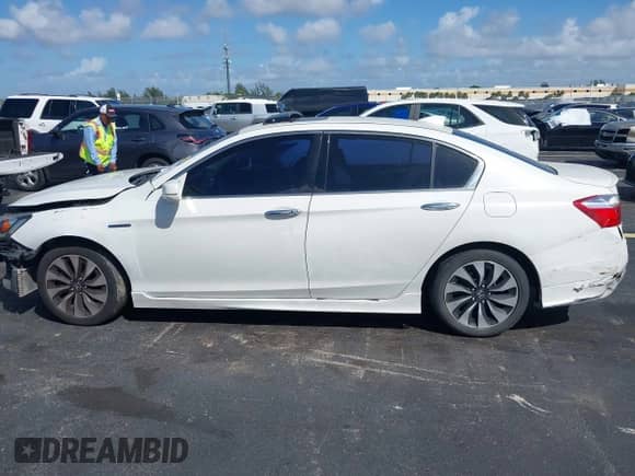 2015 Honda Accord Touring z VIN 1HGCR6F72FA005649, wystawiony jako IAAI lot #43378254 z przebiegiem 155 221 mil mil oraz . Historia ofert i sprzedaży dostępna na DreamBid. Obrazek 15.