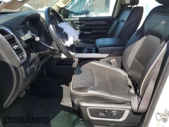 2020 Ram 1500 Laramie z VIN 1C6SRFJM6LN208434, wystawiony jako Copart lot #58059085 z przebiegiem 64 786 mil mil oraz Szkoda całkowita • Salvage title. Historia ofert i sprzedaży dostępna na DreamBid. Obrazek 7.