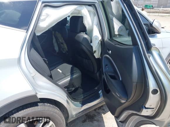 2016 Hyundai Santa Fe with VIN 5XYZU3LA2GG325786, listed as a IAAI auction lot 42515766 with 214,896 mi miles and . Bid and sale history available at DreamBid. Image 8.