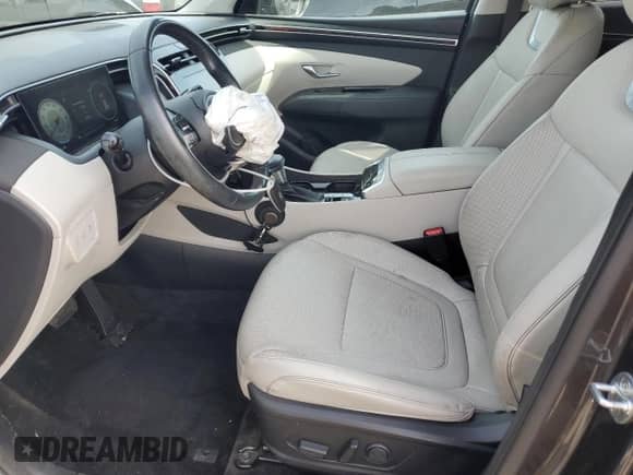 2022 Hyundai Tucson SEL with VIN 5NMJCCAE9NH062334, listed as a Copart auction lot 83770005 with 29,620 mi miles and Salvage title. Bid and sale history available at DreamBid. Image 7.