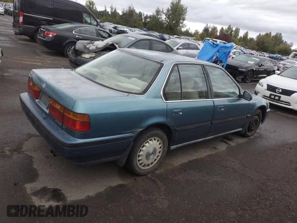 1990 Honda Accord EX z VIN JHMCB7569LC061894, wystawiony jako Copart lot #74372344 z przebiegiem 207 817 mil mil oraz Szkoda całkowita • Salvage title. Historia ofert i sprzedaży dostępna na DreamBid. Obrazek 3.