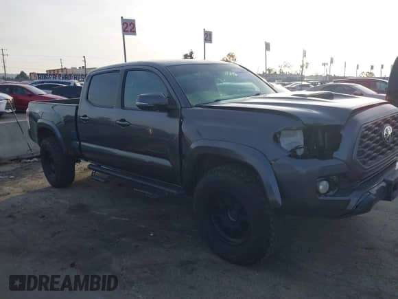 2021 Toyota Tacoma SR5 z VIN 3TMDZ5BN2MM108586, wystawiony jako IAAI lot #41604953 z przebiegiem 65 422 mil mil oraz . Historia ofert i sprzedaży dostępna na DreamBid. Obrazek 13.