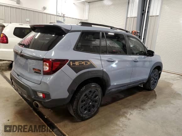 2022 Honda Passport TrailSport with VIN 5FNYF8H61NB028777, listed as a Copart auction lot 65237305 with 34,105 mi miles and Salvage title. Bid and sale history available at DreamBid. Image 3.