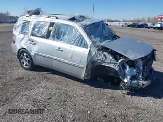 2009 Honda Pilot Touring with VIN 5FNYF48909B019027, listed as a IAAI auction lot 41701085 with Not provided miles and . Bid and sale history available at DreamBid. Image 1.