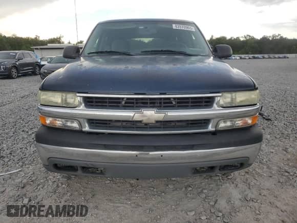 2004 Chevrolet Tahoe LT with VIN 1GNEC13Z04R122976, listed as a Copart auction lot 83970965 with 214,430 mi miles and Salvage title. Bid and sale history available at DreamBid. Image 5.
