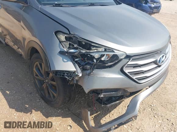 2017 Hyundai Santa Fe Ultimate with VIN 5NMZW4LA9HH047458, listed as a IAAI auction lot 43060284 with 102,219 mi miles and . Bid and sale history available at DreamBid. Image 18.