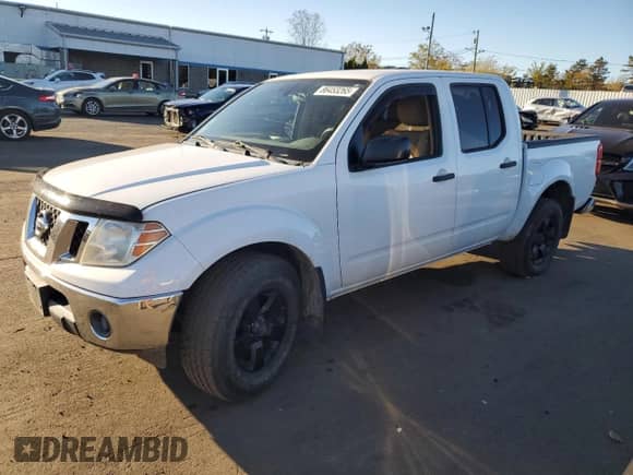 2010 Nissan Frontier Pro-4X with VIN 1N6AD0EV9AC441426, listed as a Copart auction lot 86453265 with 97,126 mi miles and Salvage title. Bid and sale history available at DreamBid. Image 1.